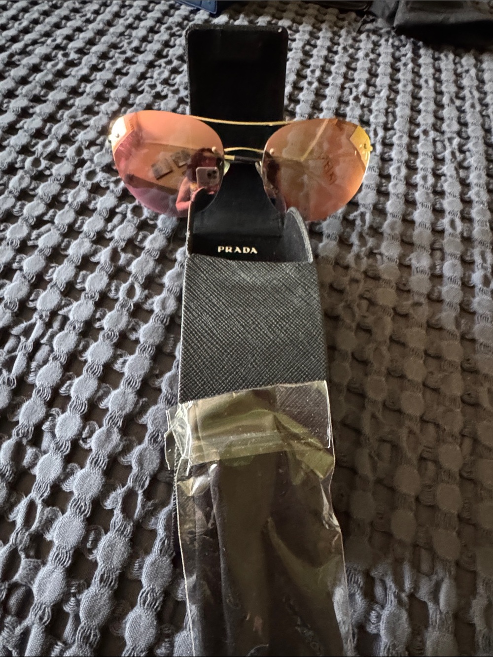 Prada Gold Frame Sunglasses with Orange-Red Mirrored Lenses